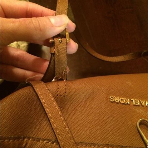 michael kors damaged purse|Michael Kors purse straps fraying.